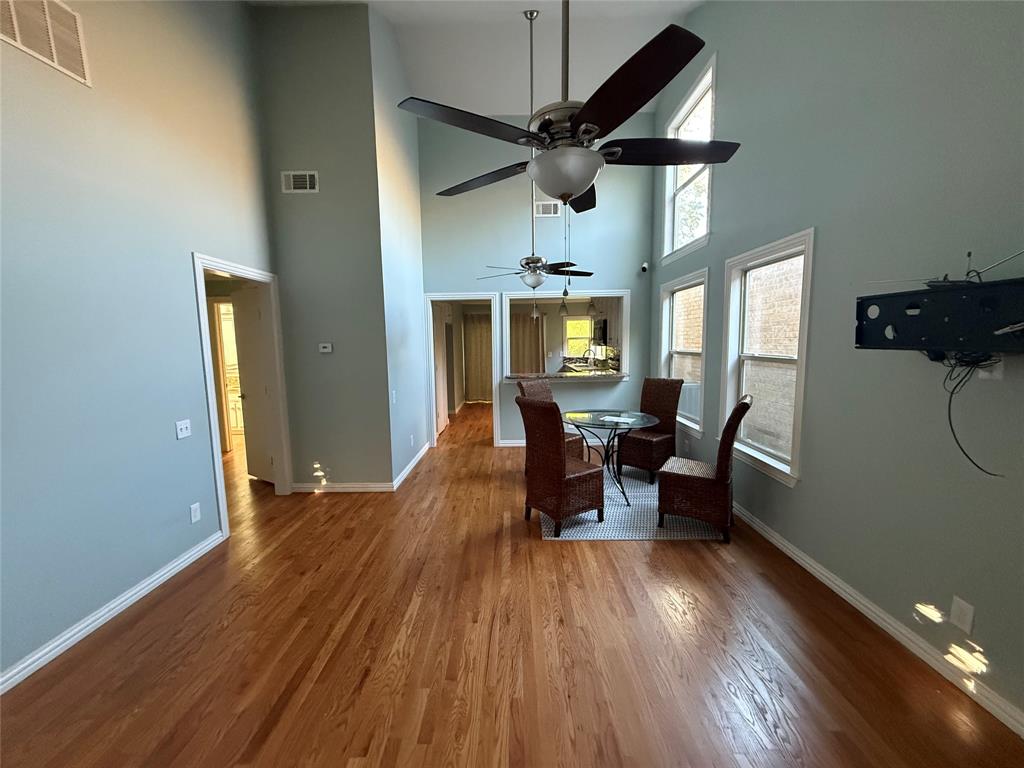 4139 Rosser Square Dallas, TX 75244 - Photo 3 of 7 a view of a livingroom with furniture and a ceiling fan
