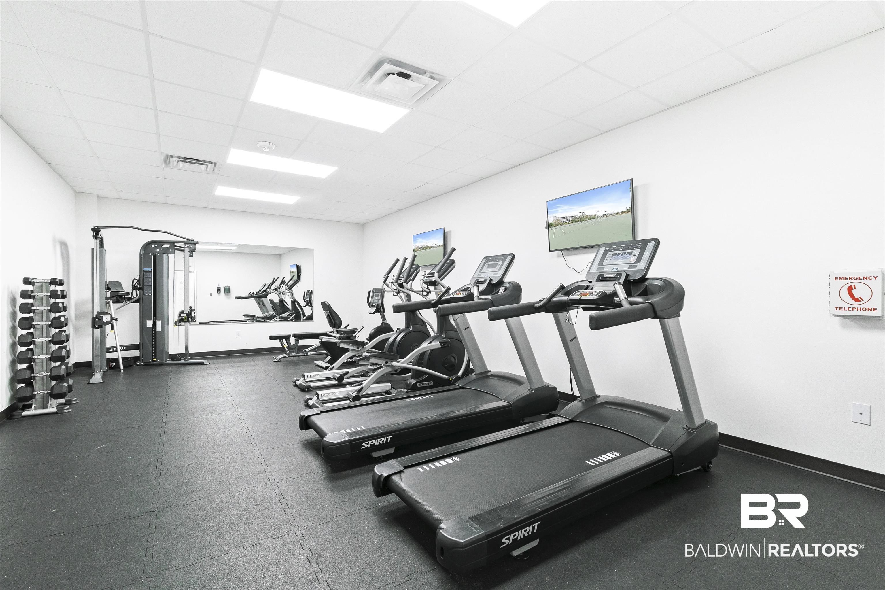 400 Plantation Road, Unit 3314 Gulf Shores, AL 36542 - Photo 30 of 47 Gym with a paneled ceiling