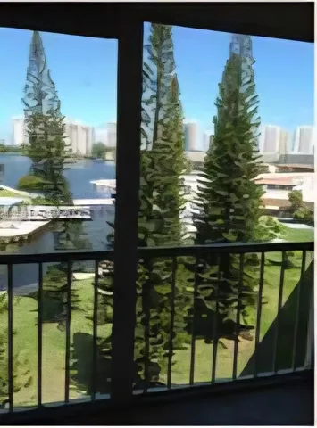 a view of swimming pool from a balcony