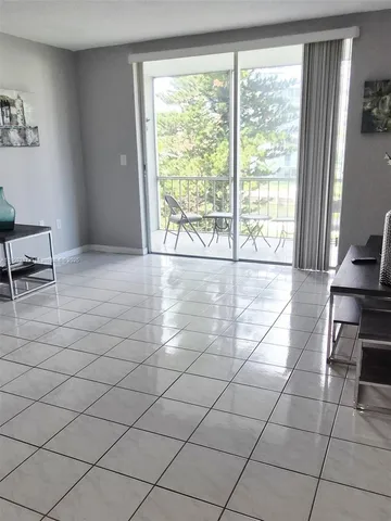 a view of a livingroom with lounge chair