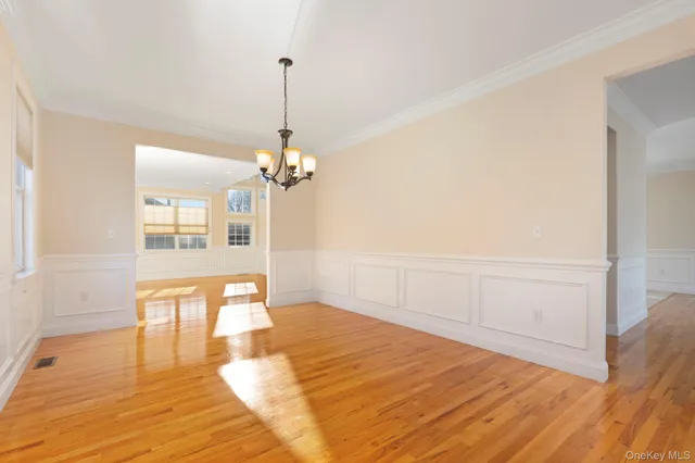 a view of a livingroom with wooden floor