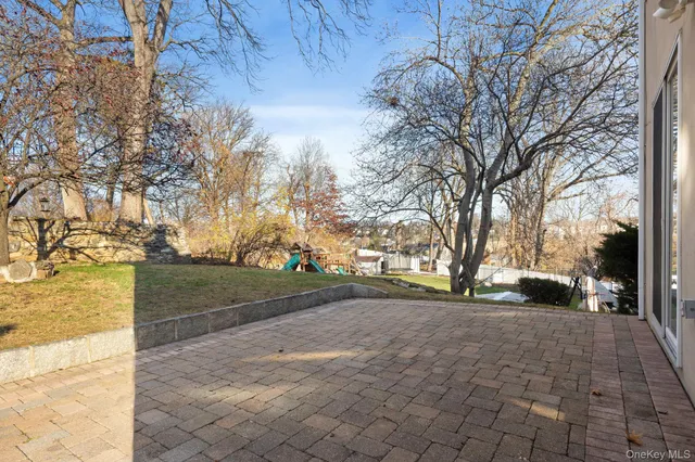 a view of balcony with wooden floor