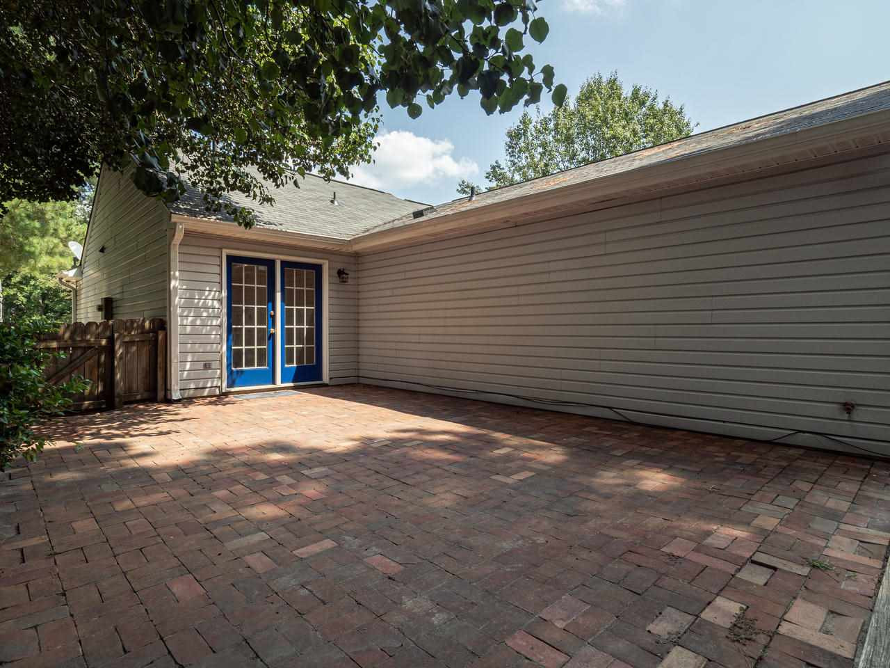 4609 Fox Road Raleigh, NC 27616 - Photo 5 of 7 This patio is large enough to accommodate all your guests. Backyard