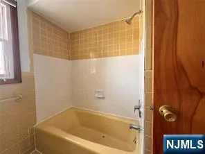 a bathroom with a bathtub