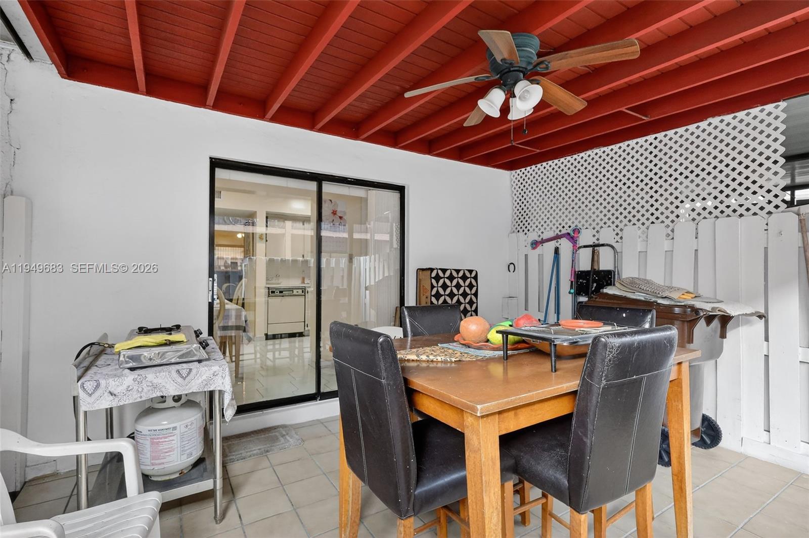 2224 West 53rd Place, Unit 2224 Hialeah, FL 33016 - Photo 26 of 27 a workspace with furniture and window