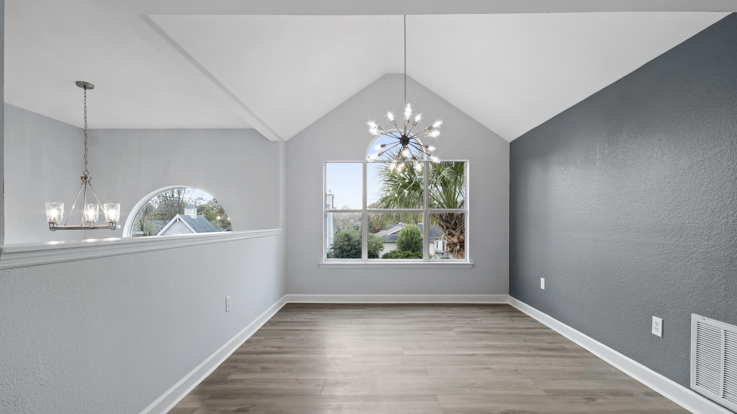 1190 Bay Court Destin, FL 32541 - Photo 11 of 52 a view of a room with wooden floor chandelier and entryway