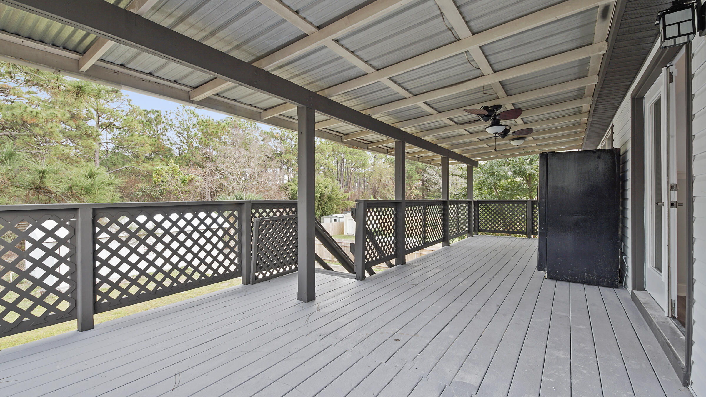 1190 Bay Court Destin, FL 32541 - Photo 20 of 52 a view of a balcony with wooden floor