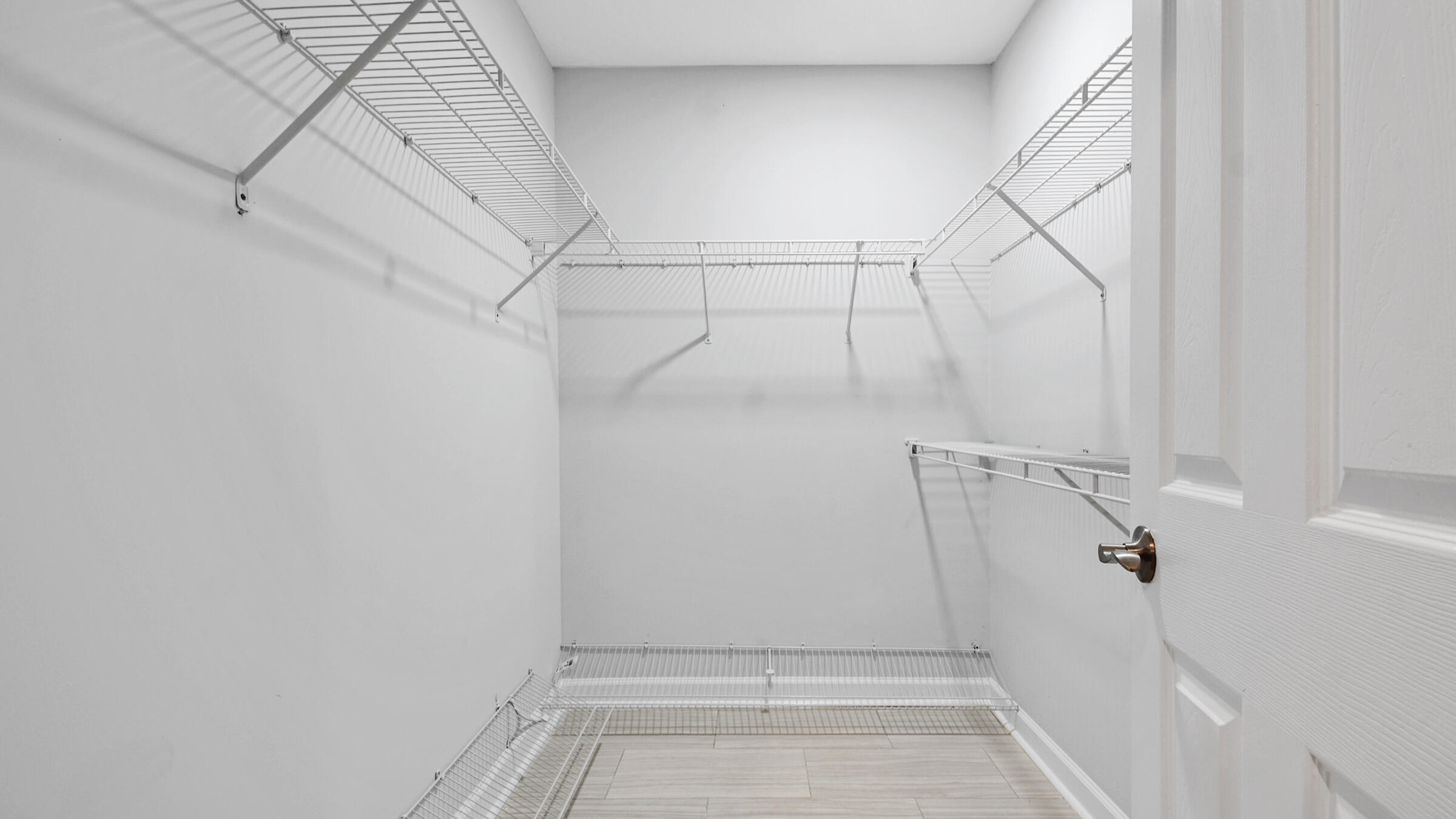 1190 Bay Court Destin, FL 32541 - Photo 27 of 52 a view of a room with racks on the wall