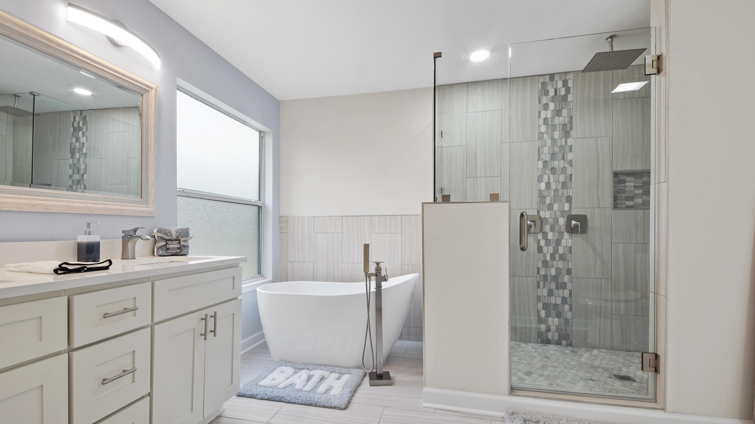 1190 Bay Court Destin, FL 32541 - Photo 28 of 52 a bathroom with a double vanity sink mirror and shower