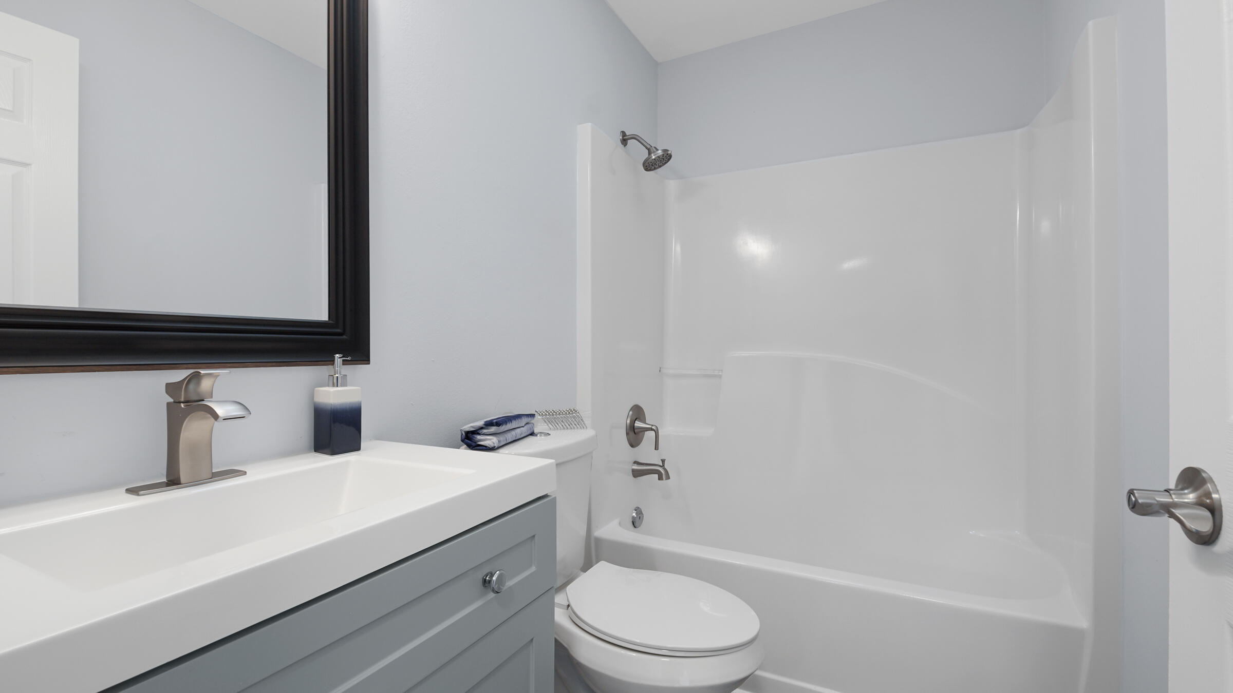 1190 Bay Court Destin, FL 32541 - Photo 33 of 52 a bathroom with a sink a toilet and shower