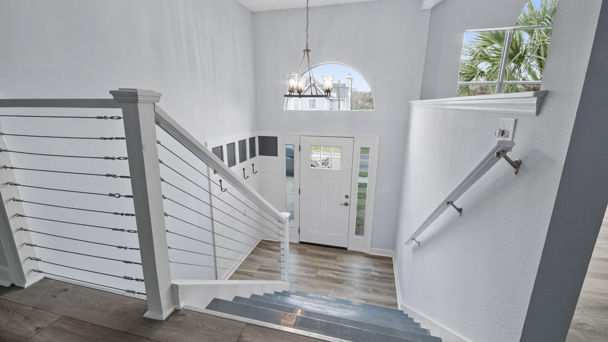 1190 Bay Court Destin, FL 32541 - Photo 36 of 52 a view of entryway and hall with wooden floor