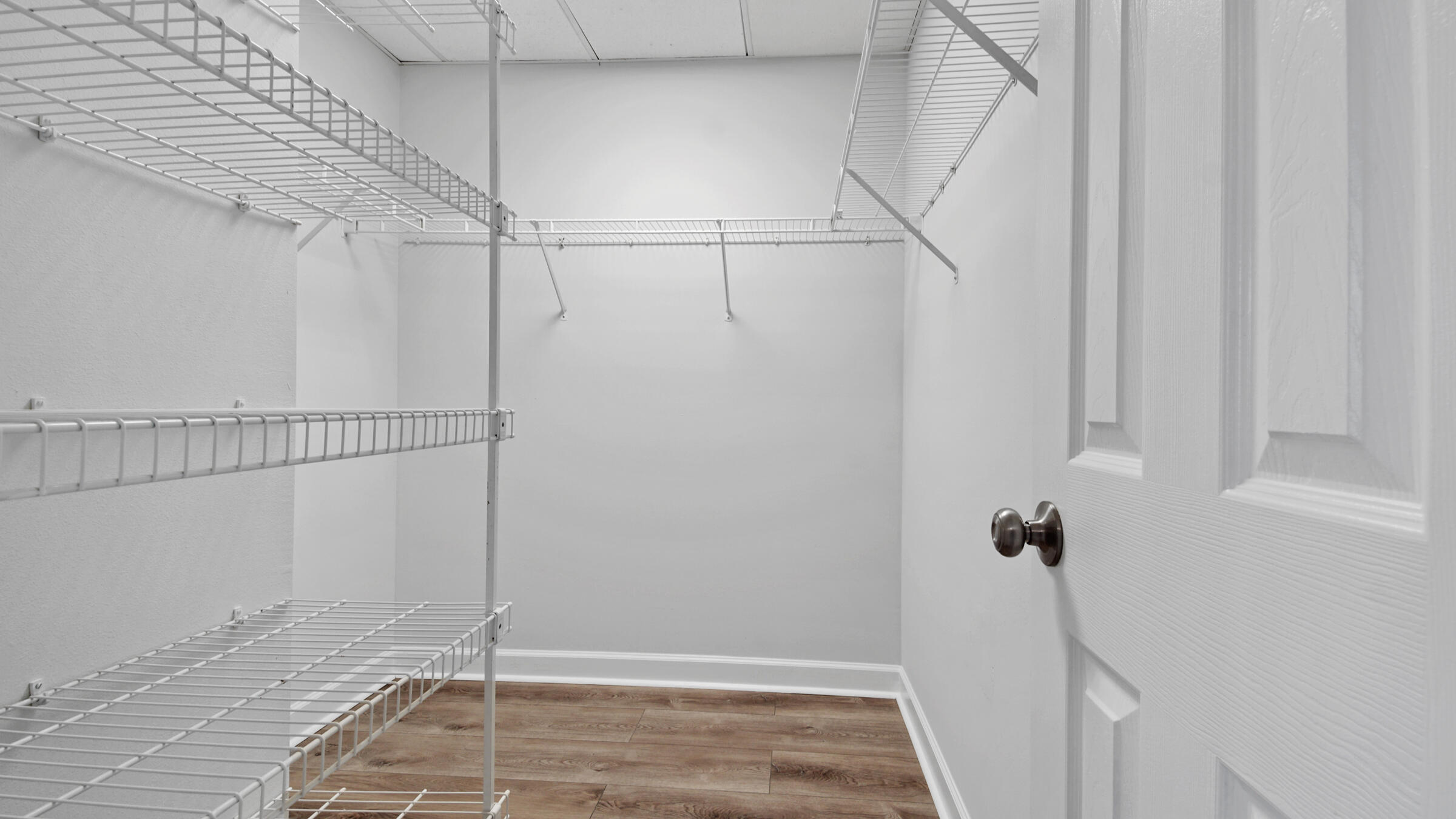1190 Bay Court Destin, FL 32541 - Photo 39 of 52 a view of a room with racks on the wall