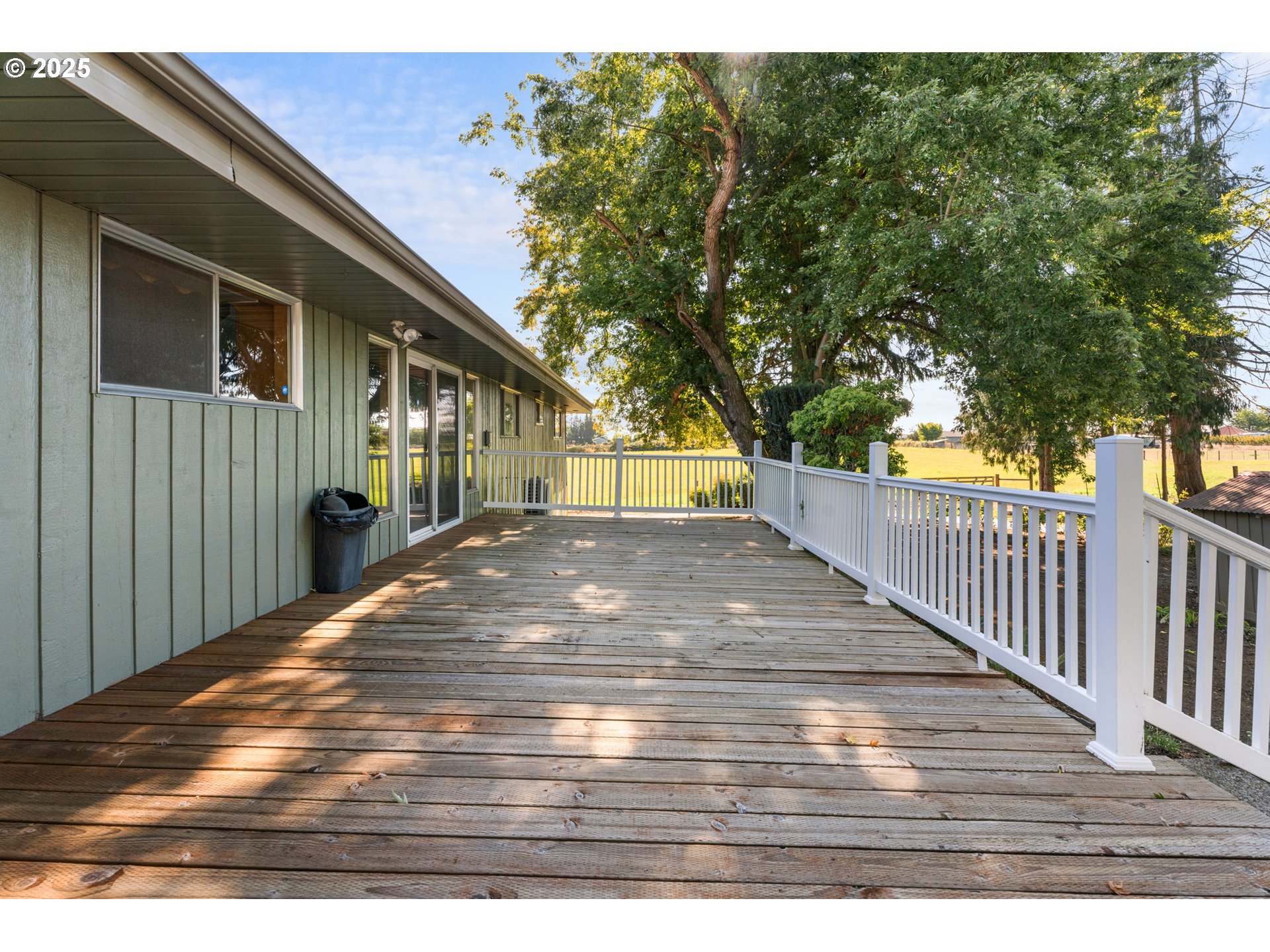 15895 Old Butteville Road Northeast Woodburn, OR 97071 - Photo 28 of 47 a view of outdoor space with deck and yard