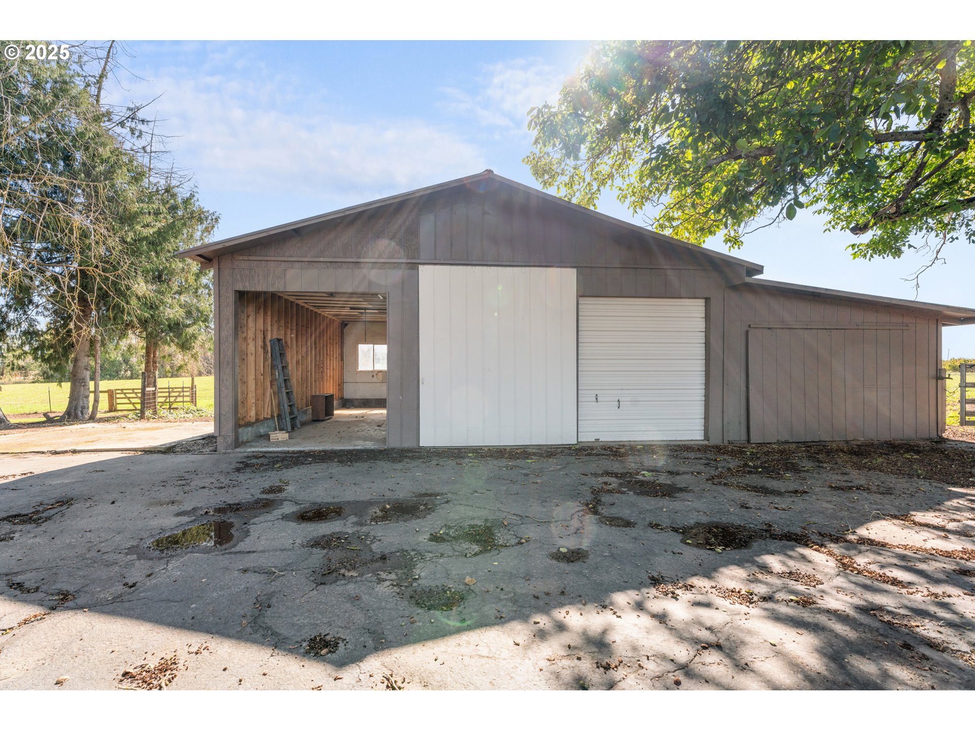 15895 Old Butteville Road Northeast Woodburn, OR 97071 - Photo 31 of 47 a view of a house with a yard