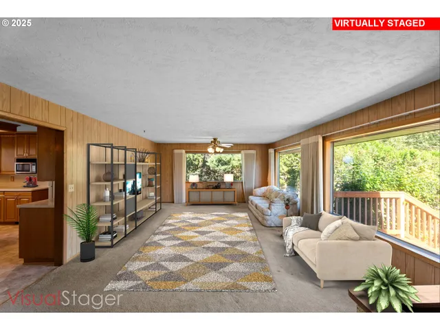 a living room with furniture large window and flat screen tv