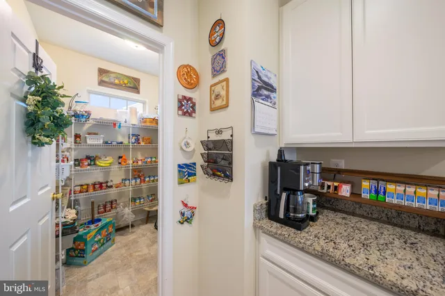 a utility room with window dryer and washer