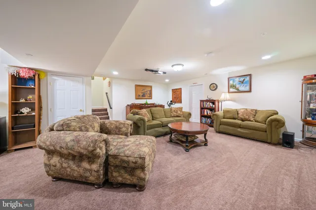 a living room with furniture and a couch