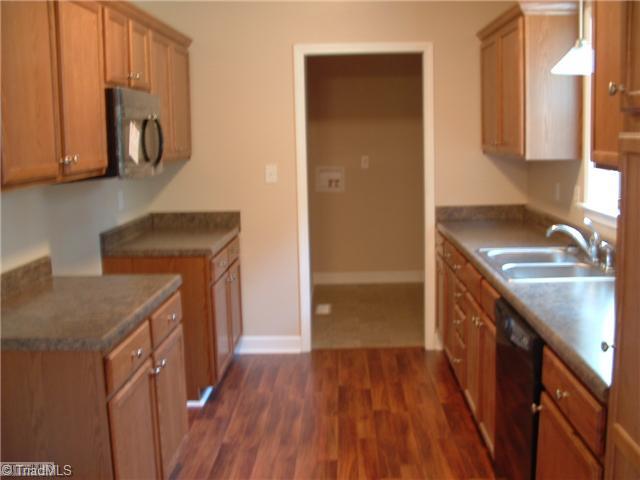171 Stratford Road Lexington, NC 27292 - Photo 2 of 11 Kitchen. The color scheme in this home is inviting. A smooth top range/oven will be installed