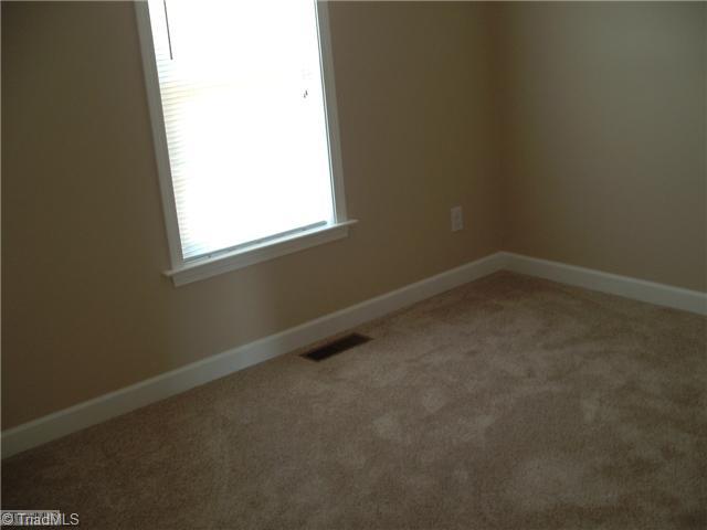 171 Stratford Road Lexington, NC 27292 - Photo 7 of 11 3rd Bedroom. The back bedroom with lovely carpet and nice color trim