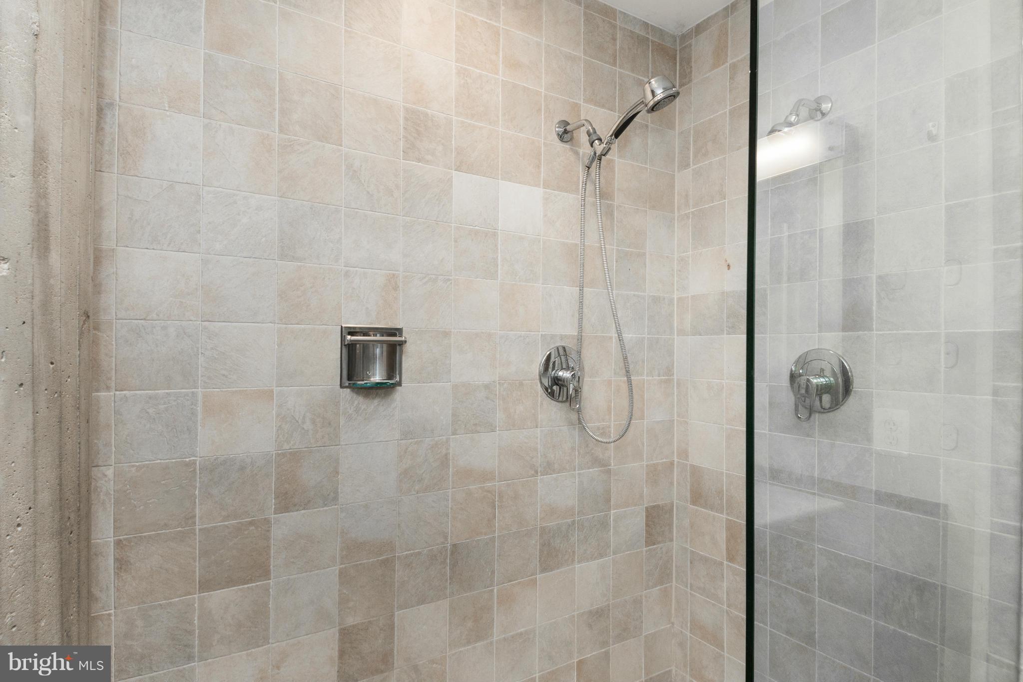 1401 Church Street Northwest, Unit 306 Washington, DC 20005 - Photo 14 of 18 a bathroom with a shower