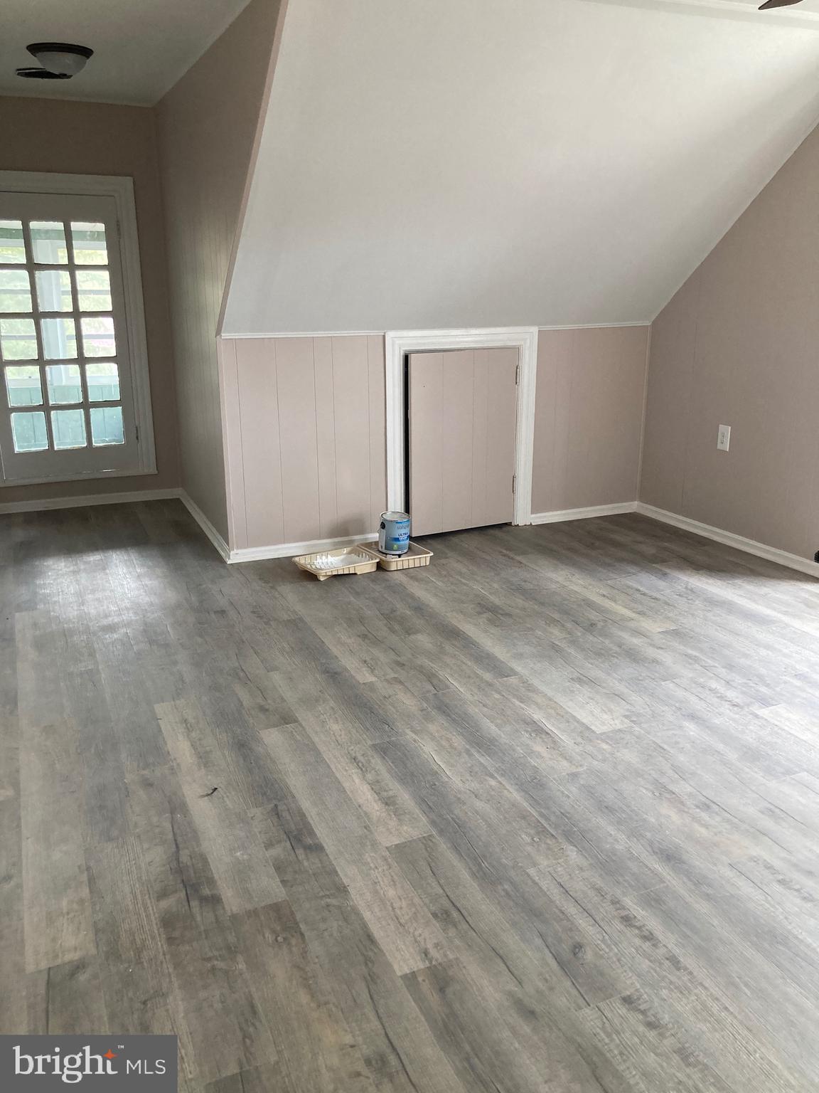 313 Edgewood Drive, Unit E Ambler, PA 19002 - Photo 6 of 9 an empty room with windows