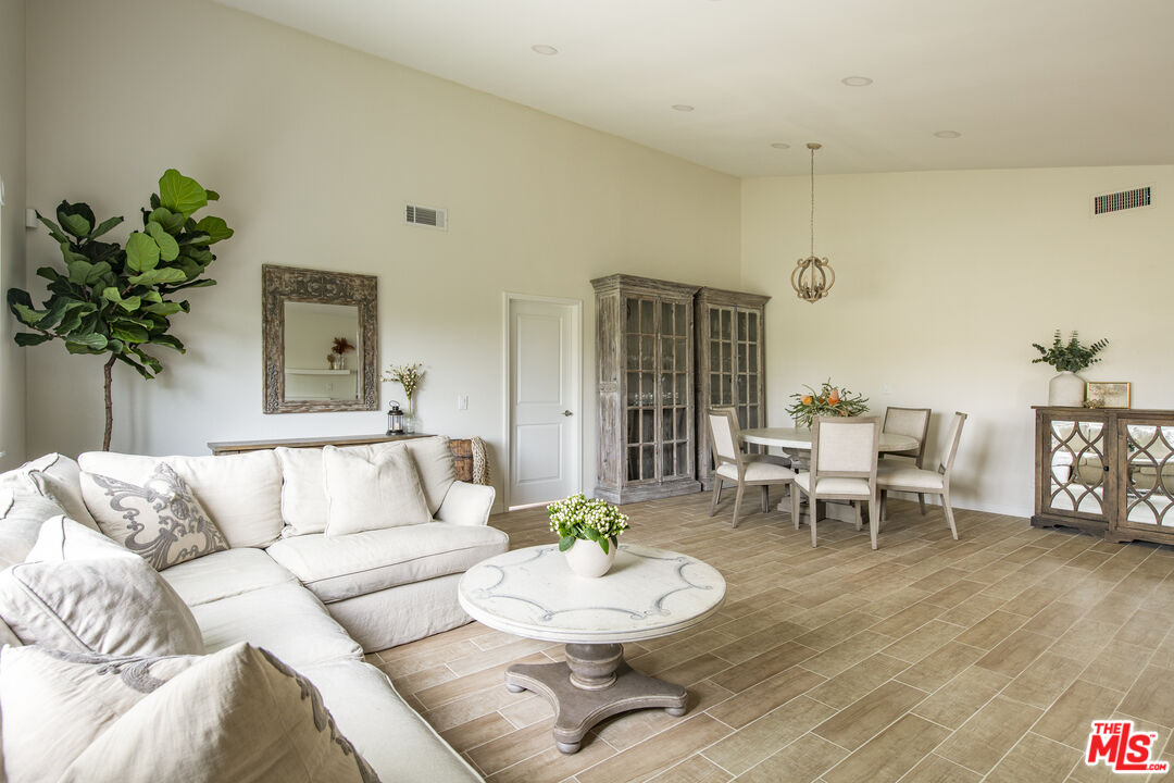 29720 Monte Verde Road Temecula, CA 92591 - Photo 15 of 49 a living room with furniture and a potted plant