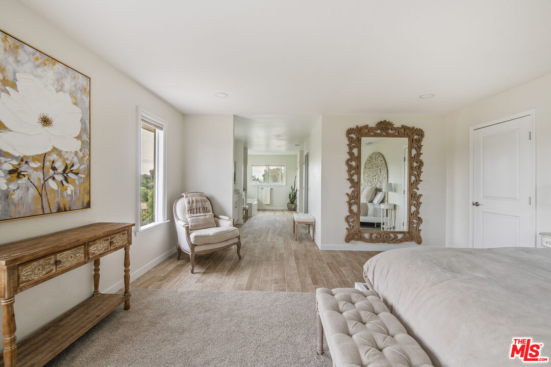 29720 Monte Verde Road Temecula, CA 92591 - Photo 17 of 49 a living room with furniture and painting on the wall