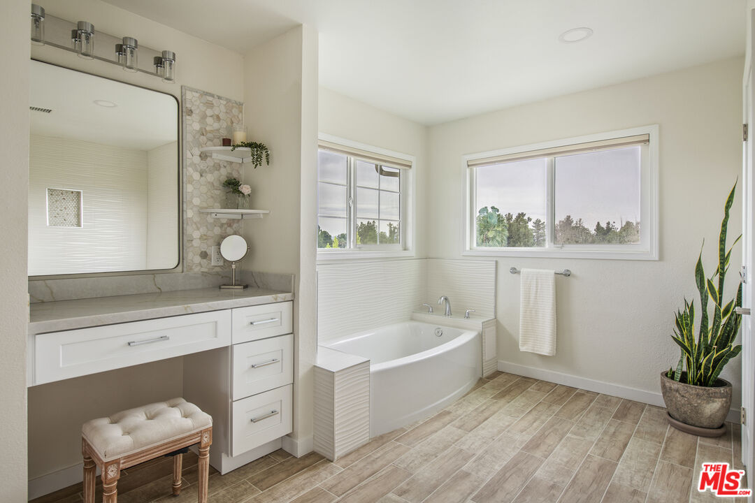 29720 Monte Verde Road Temecula, CA 92591 - Photo 21 of 49 a living room with furniture and a potted plant