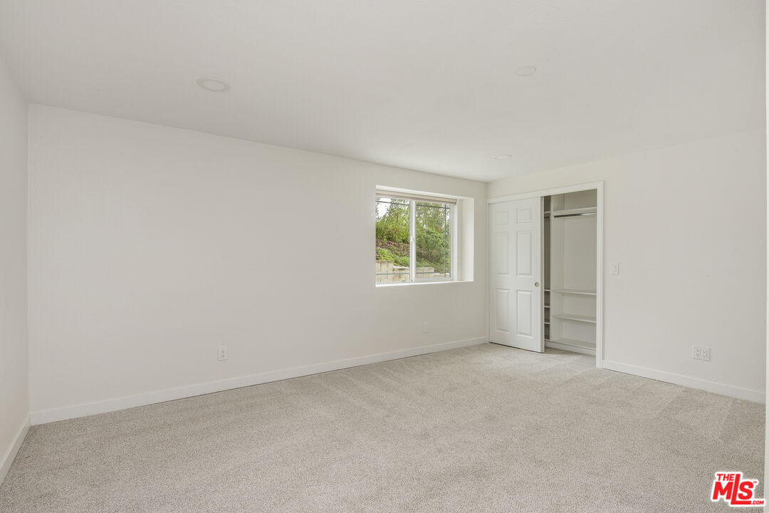29720 Monte Verde Road Temecula, CA 92591 - Photo 29 of 49 an empty room with windows