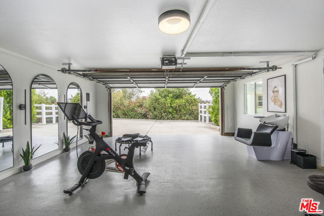 29720 Monte Verde Road Temecula, CA 92591 - Photo 36 of 49 a view of a room with gym equipment