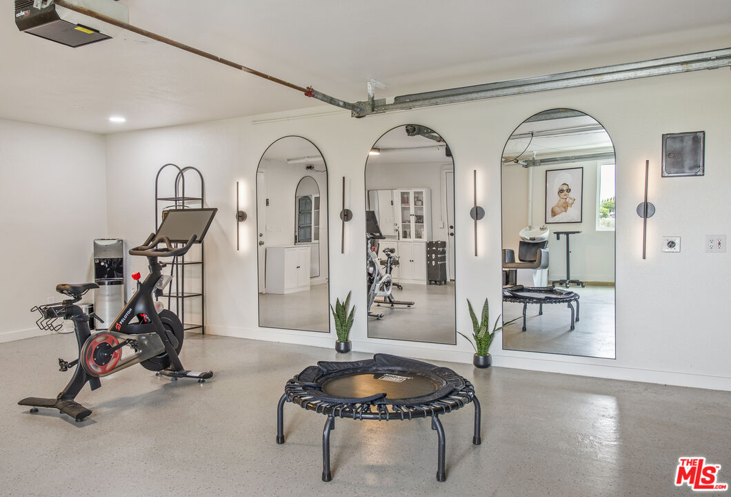 29720 Monte Verde Road Temecula, CA 92591 - Photo 37 of 49 a living room with furniture and a wooden floor