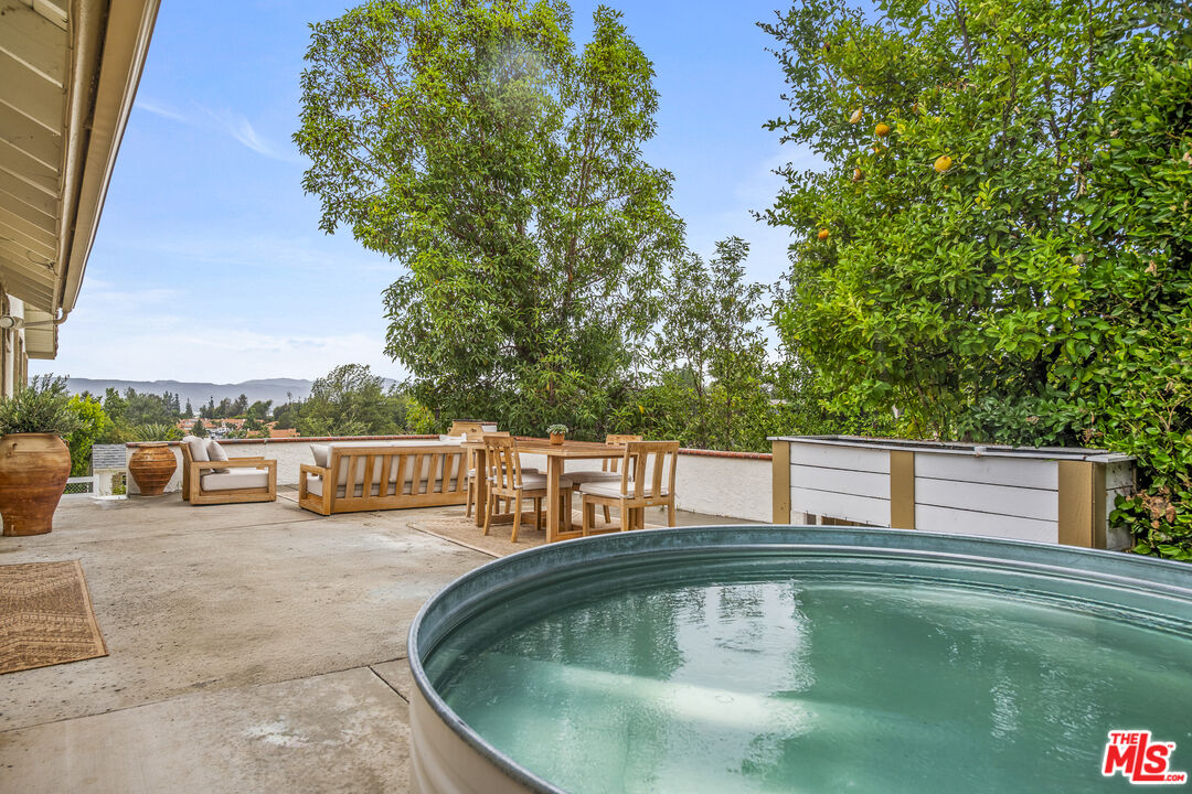 29720 Monte Verde Road Temecula, CA 92591 - Photo 41 of 49 a view of swimming pool with a patio