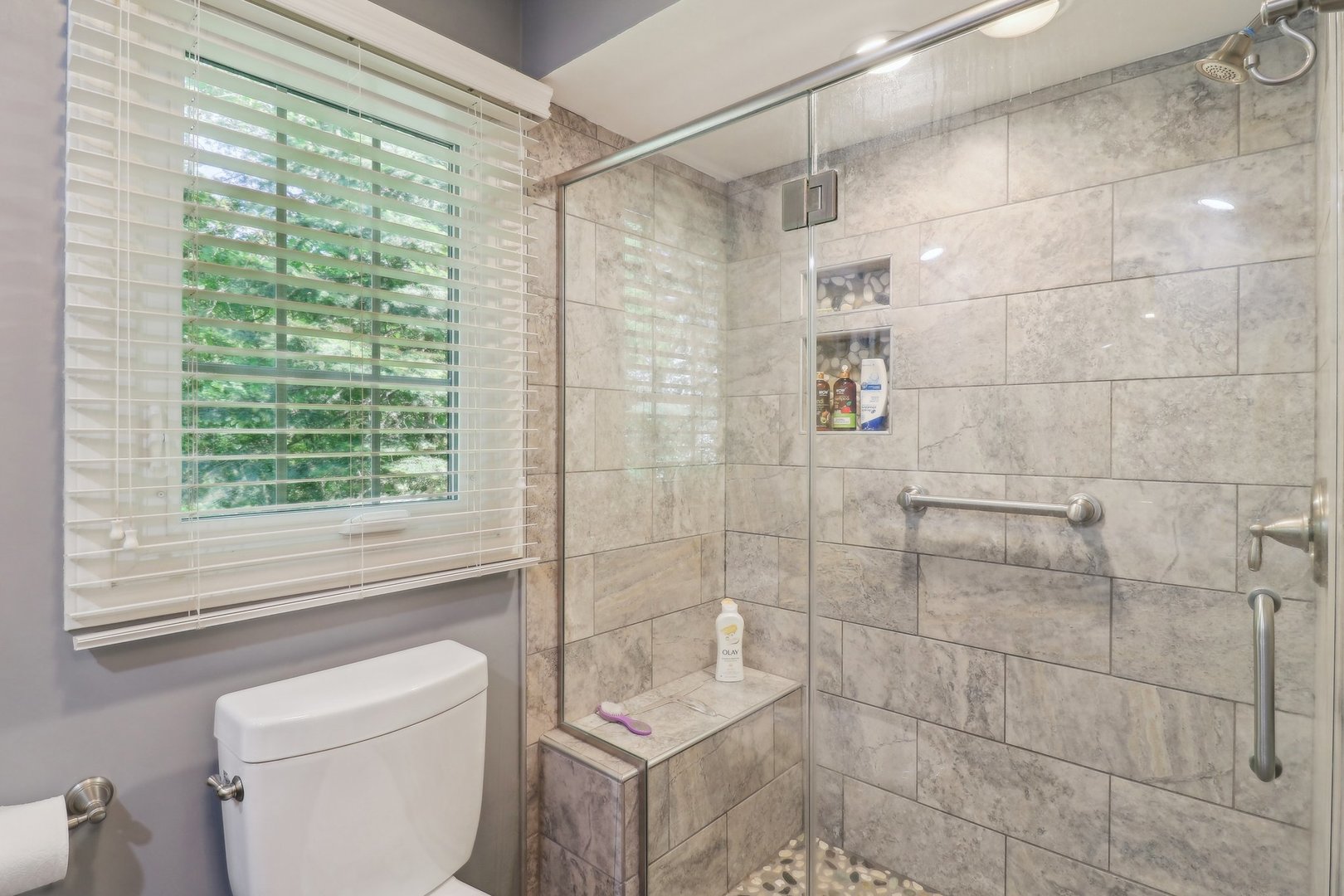 554 Baintree Road Davis, IL 61019 - Photo 24 of 53 a bathroom with a shower a toilet and a window