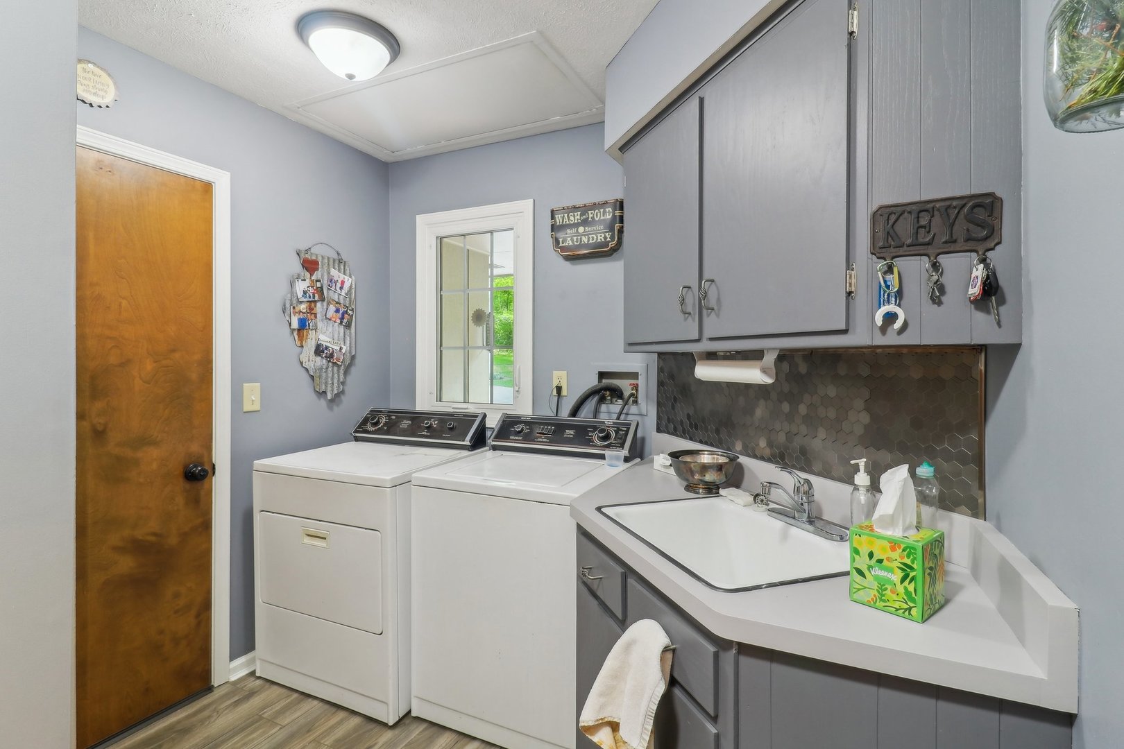 554 Baintree Road Davis, IL 61019 - Photo 29 of 53 a kitchen with a sink a stove and cabinets