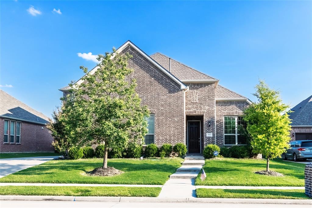 953 Holt Lane Allen, TX 75013 - Photo 1 of 1 a front view of a house with a yard