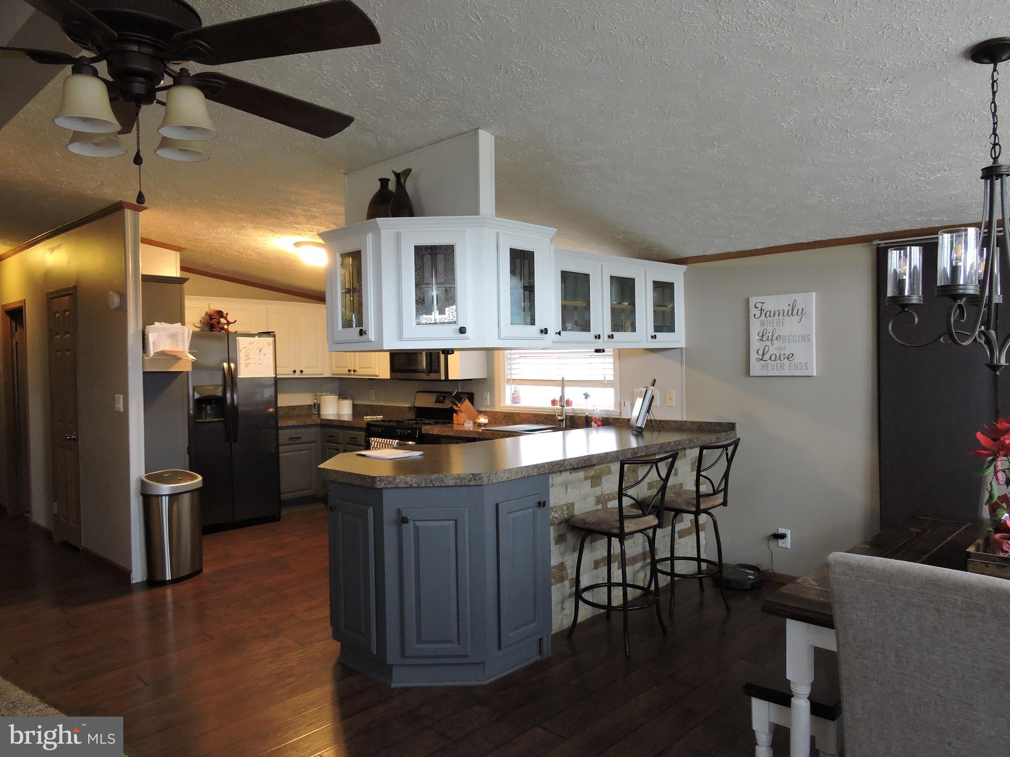 29037 Fire Tower Road Laurel, DE 19956 - Photo 34 of 40 Kitchen with eat at breakfast bar