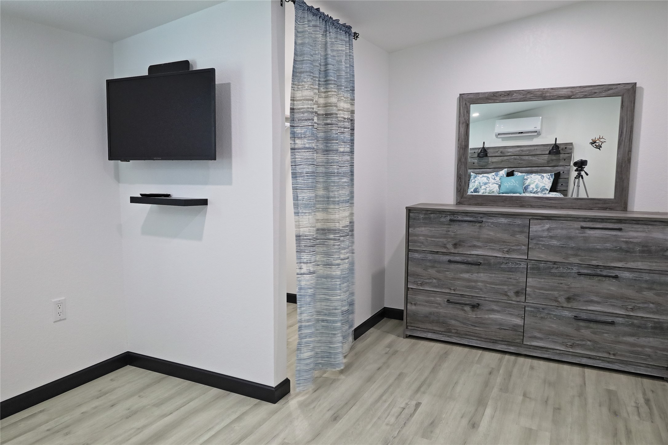 4402 Zelsky Road Freeport, TX 77541 - Photo 20 of 37 Unit B - Mounted TV and Dresser