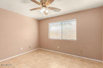 10344 West Trumbull Road Tolleson, AZ 85353 - Photo 17 of 22 a view of an empty room with a window