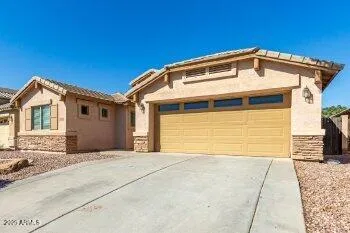 a view of a house with a garage
