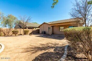 10344 West Trumbull Road Tolleson, AZ 85353 - Photo 21 of 22 a view of a house with snow on the road