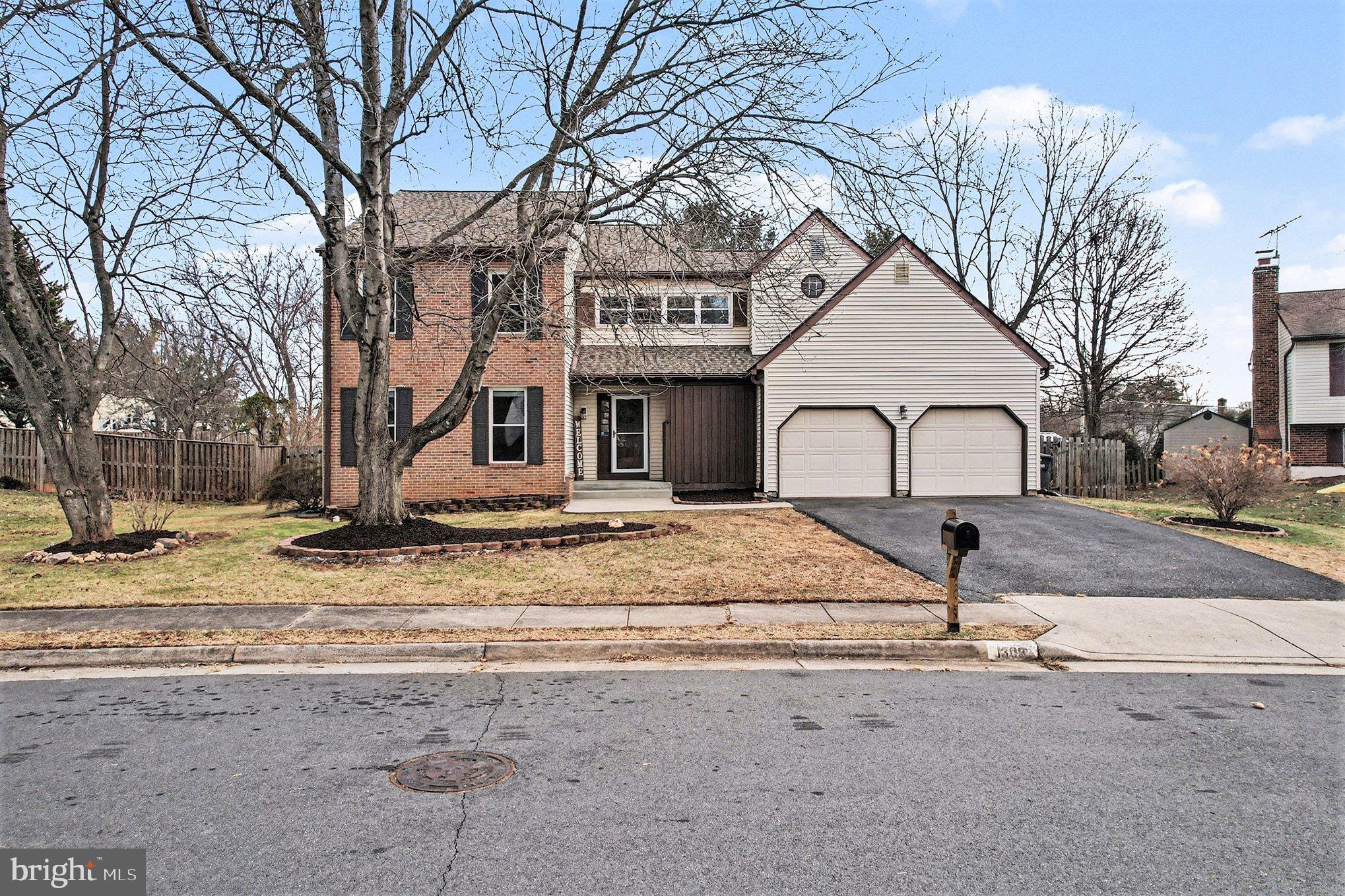 1309 Rock Chapel Road Herndon, VA 20170 - Photo 2 of 41 a house with trees in front of it