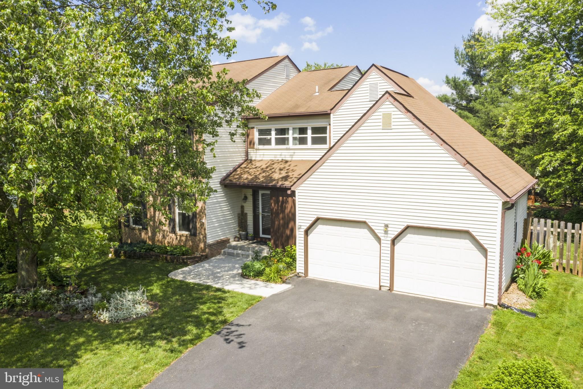 1309 Rock Chapel Road Herndon, VA 20170 - Photo 2 of 3 a view of house along with trees in the background