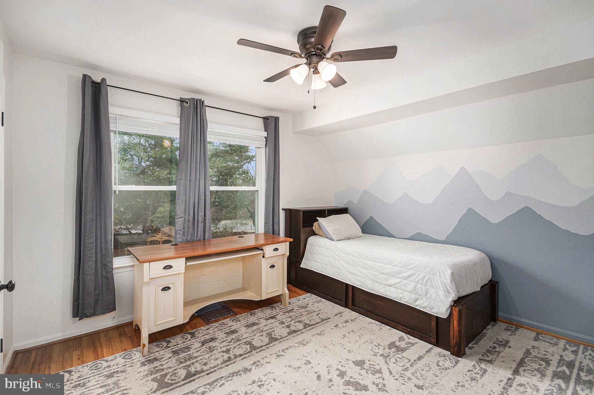 1309 Rock Chapel Road Herndon, VA 20170 - Photo 24 of 41 a bedroom with a large bed and a window