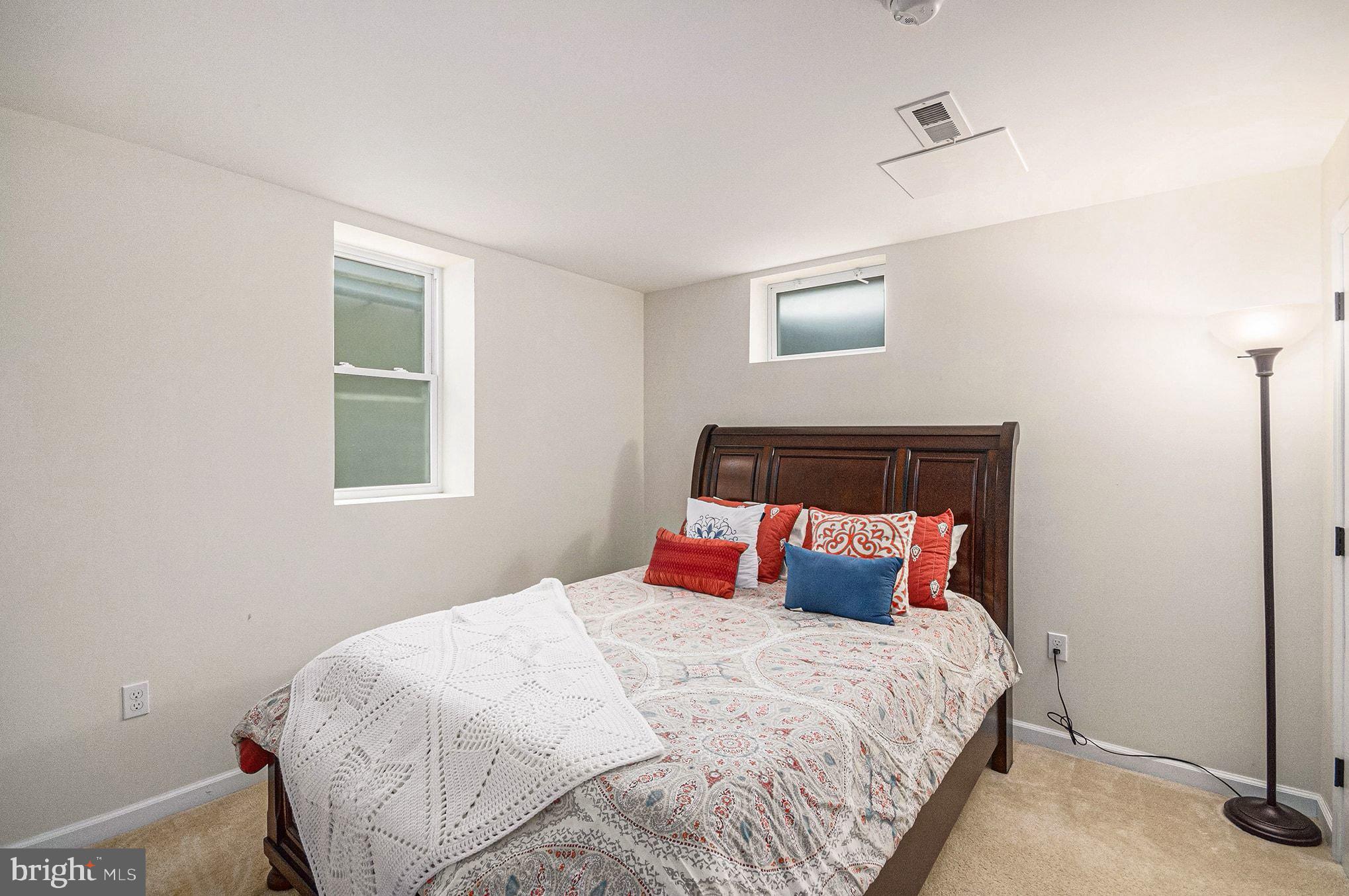 1309 Rock Chapel Road Herndon, VA 20170 - Photo 30 of 41 a bedroom with a bed and a window