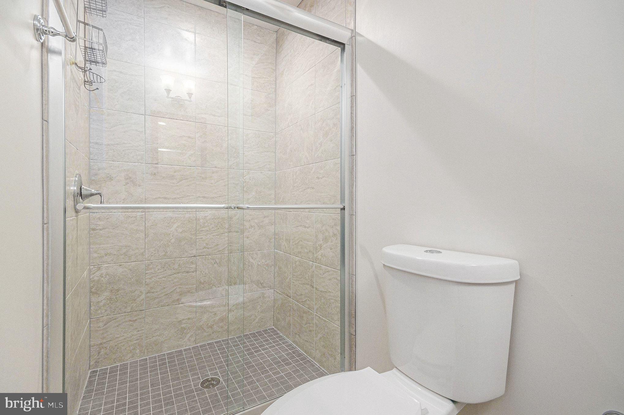 1309 Rock Chapel Road Herndon, VA 20170 - Photo 31 of 41 a bathroom with a shower and a toilet