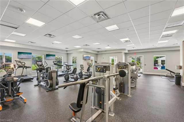 a view of a house with swimming pool and a yard
