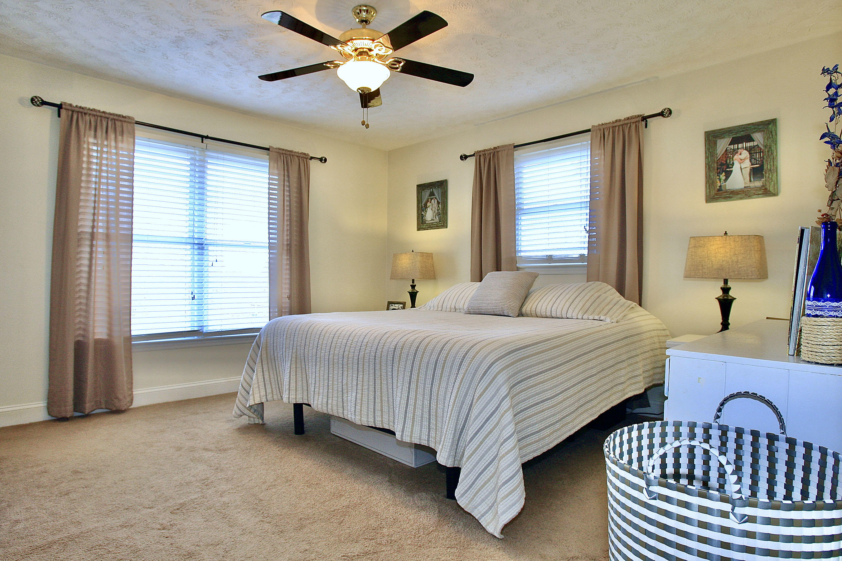 1025 Rock Spring Road Goodview, VA 24095 - Photo 22 of 73 a bedroom with a bed dresser and a window