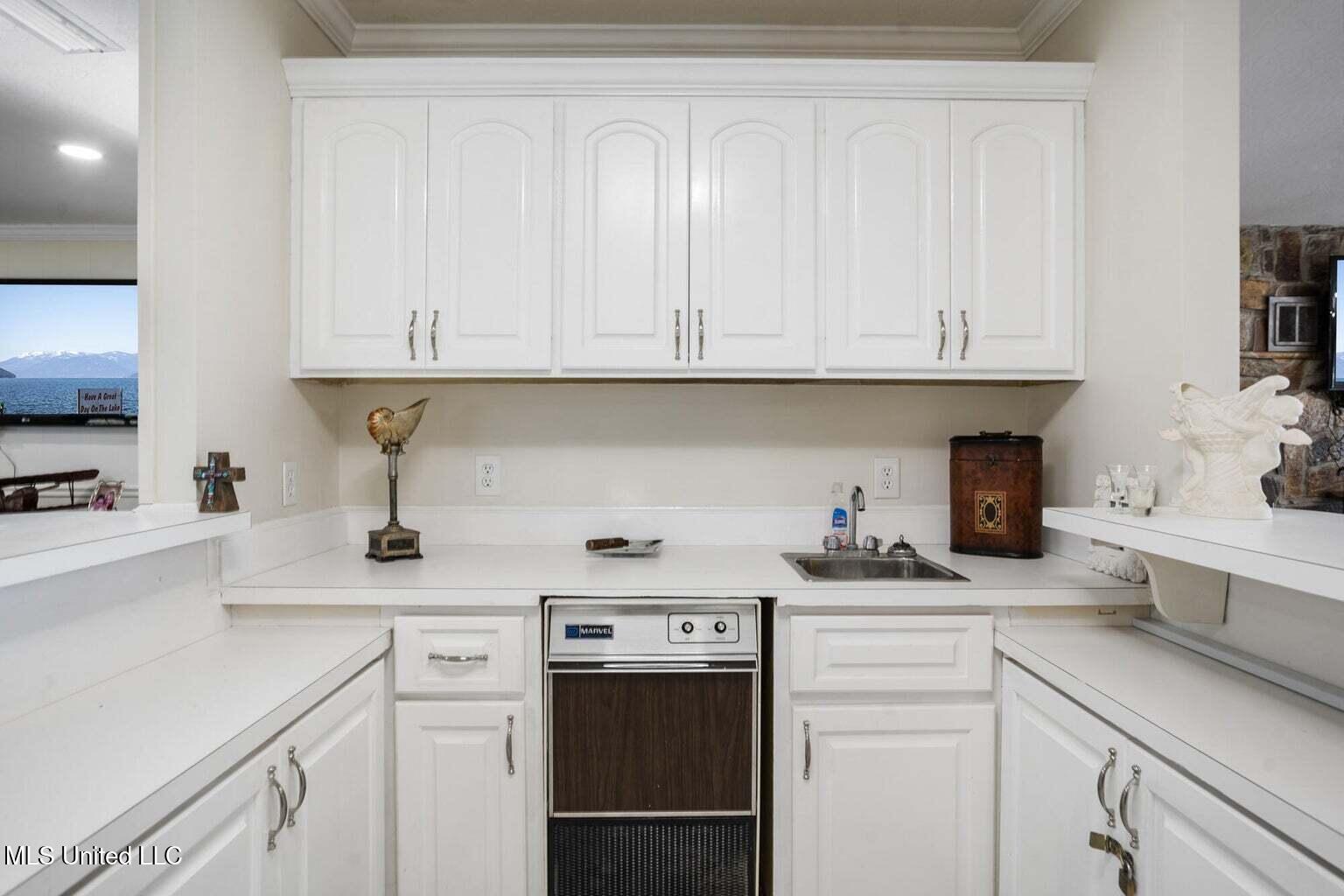 113 Lucas Road Sumrall, MS 39482 - Photo 22 of 52 Wet Bar Between Game Room and Great Room