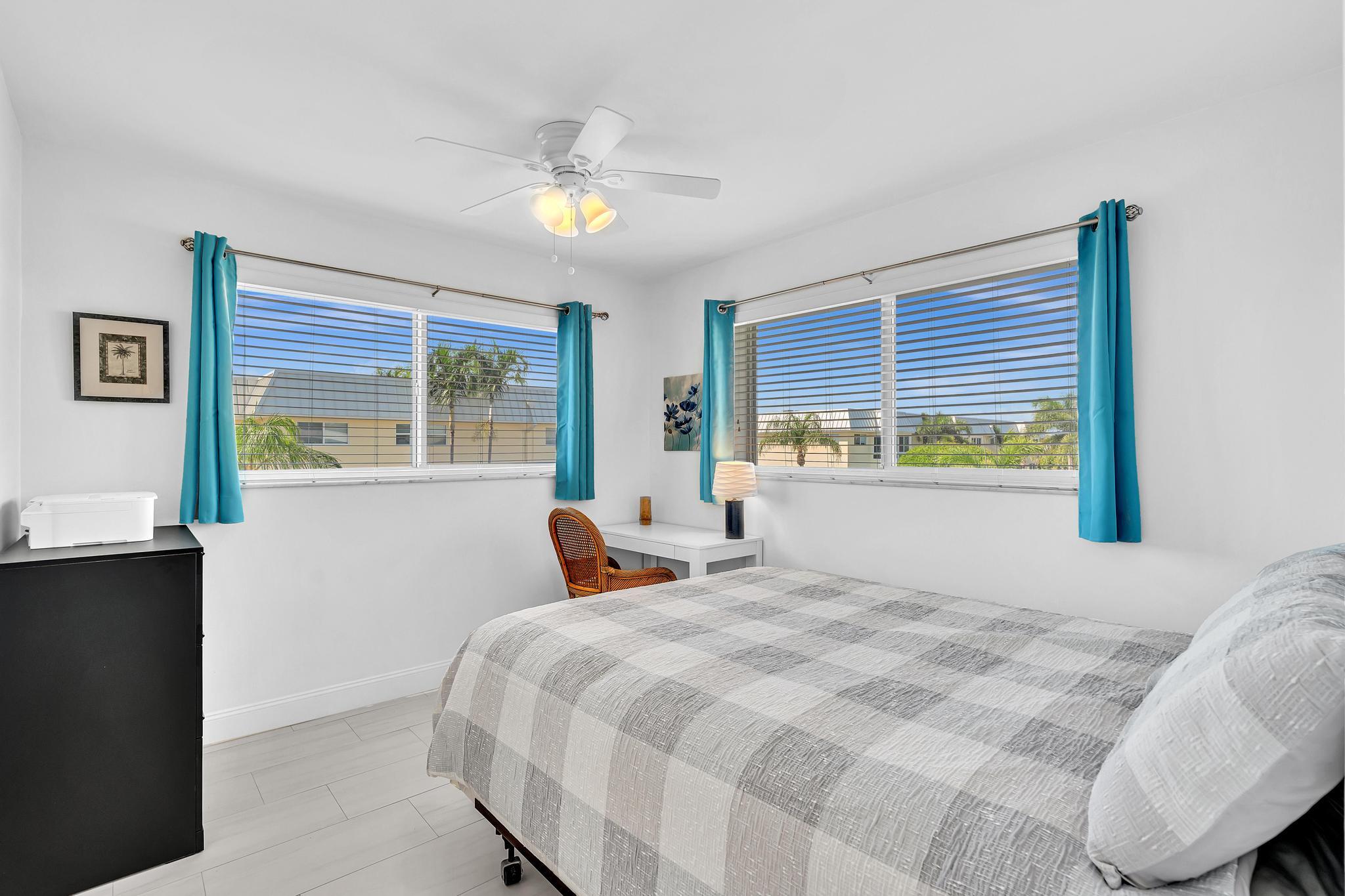 3 Colonial Club Drive, Unit 300 Boynton Beach, FL 33435 - Photo 24 of 71 a bedroom with a bed and a window