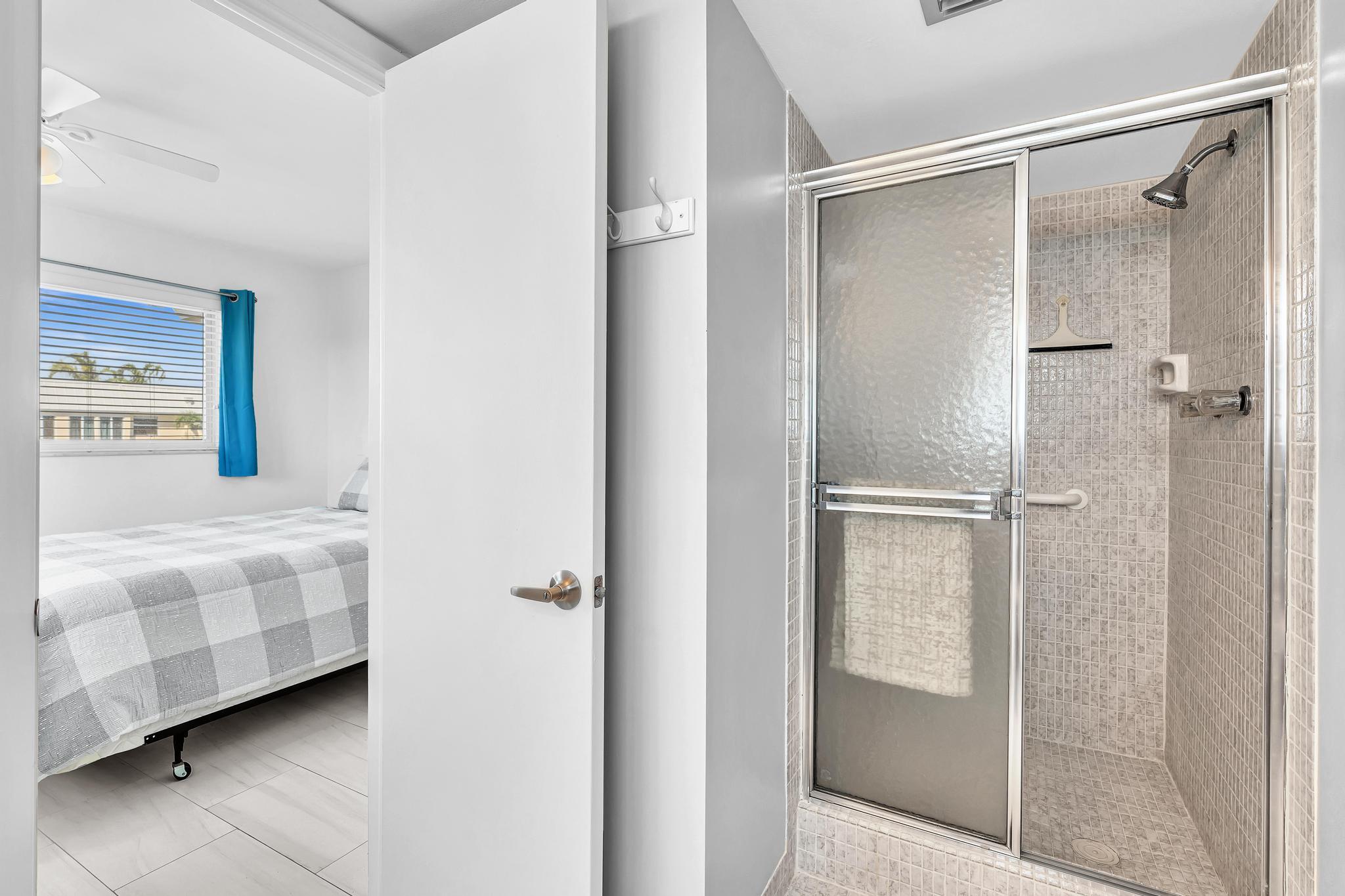 3 Colonial Club Drive, Unit 300 Boynton Beach, FL 33435 - Photo 26 of 71 a bathroom with a double vanity sink and mirror